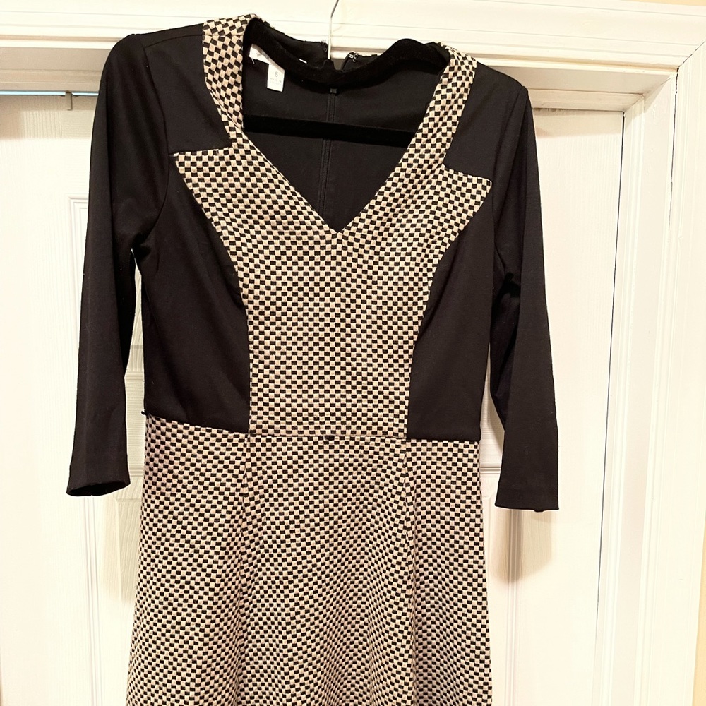 Polyester blend, knee length dress. V-neck